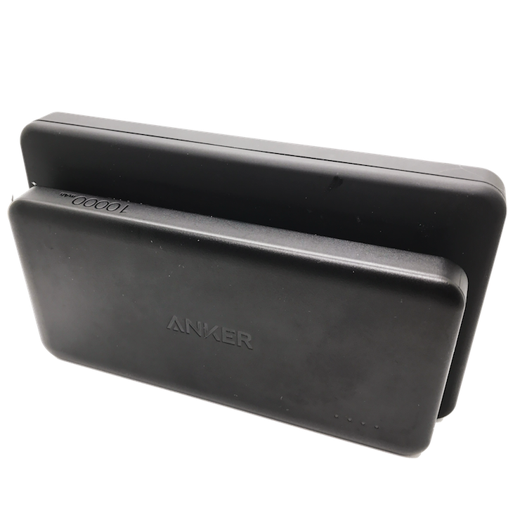 Anker PowerCore II Slim 10.000 mAh in front vs. AmazonBasics power bank in the back